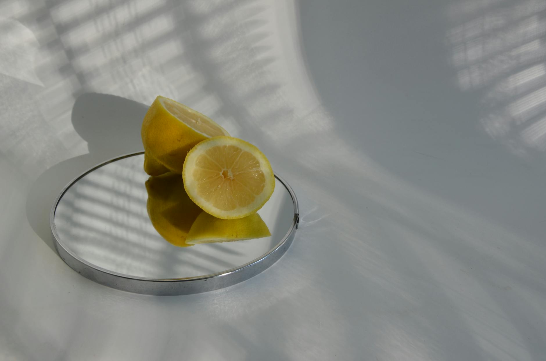 Woman holding Lemon vibrators thoughtfully, representing the careful approach to pleasure recovery