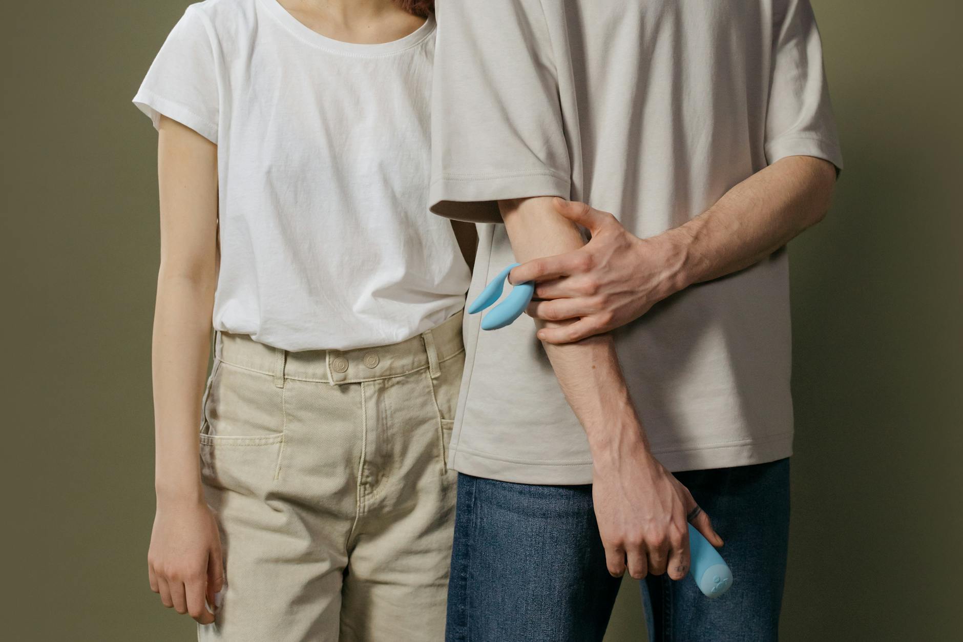 A couple reconnecting with a modern clitoral vibrator, symbolizing intimacy after recovery.